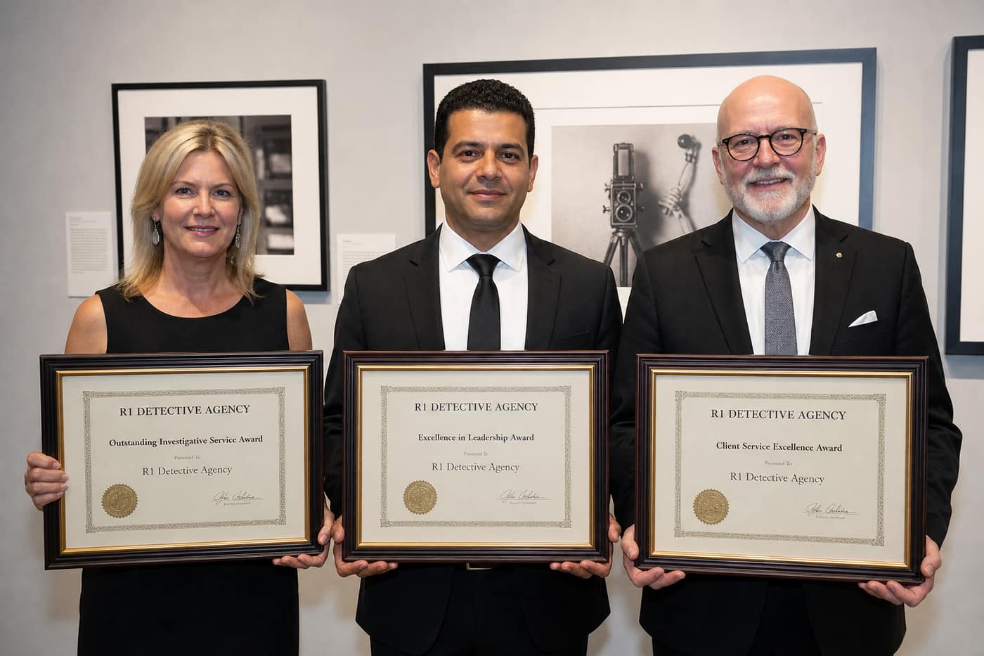 R1 Detective Agency framed certificates row